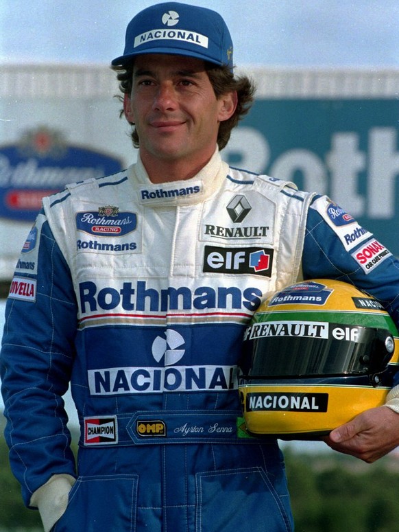 Three-time Formula One world champion Ayrton Senna of Brazil poses for photographers during the presentation of the Williams team for the 1994 season at Estoril circuit on January 19, 1994. Senna died ...