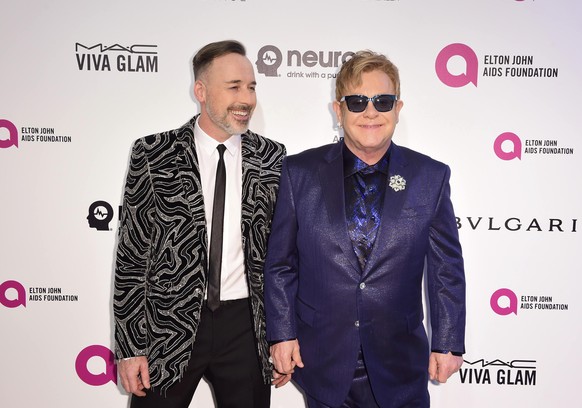 Ein US-Polizist bezichtigt Elton John (hier mit seinem Partner David Furnish) der Belästigung. Alles Lüge, sagt der britische Musiker selbst.<br data-editable="remove">