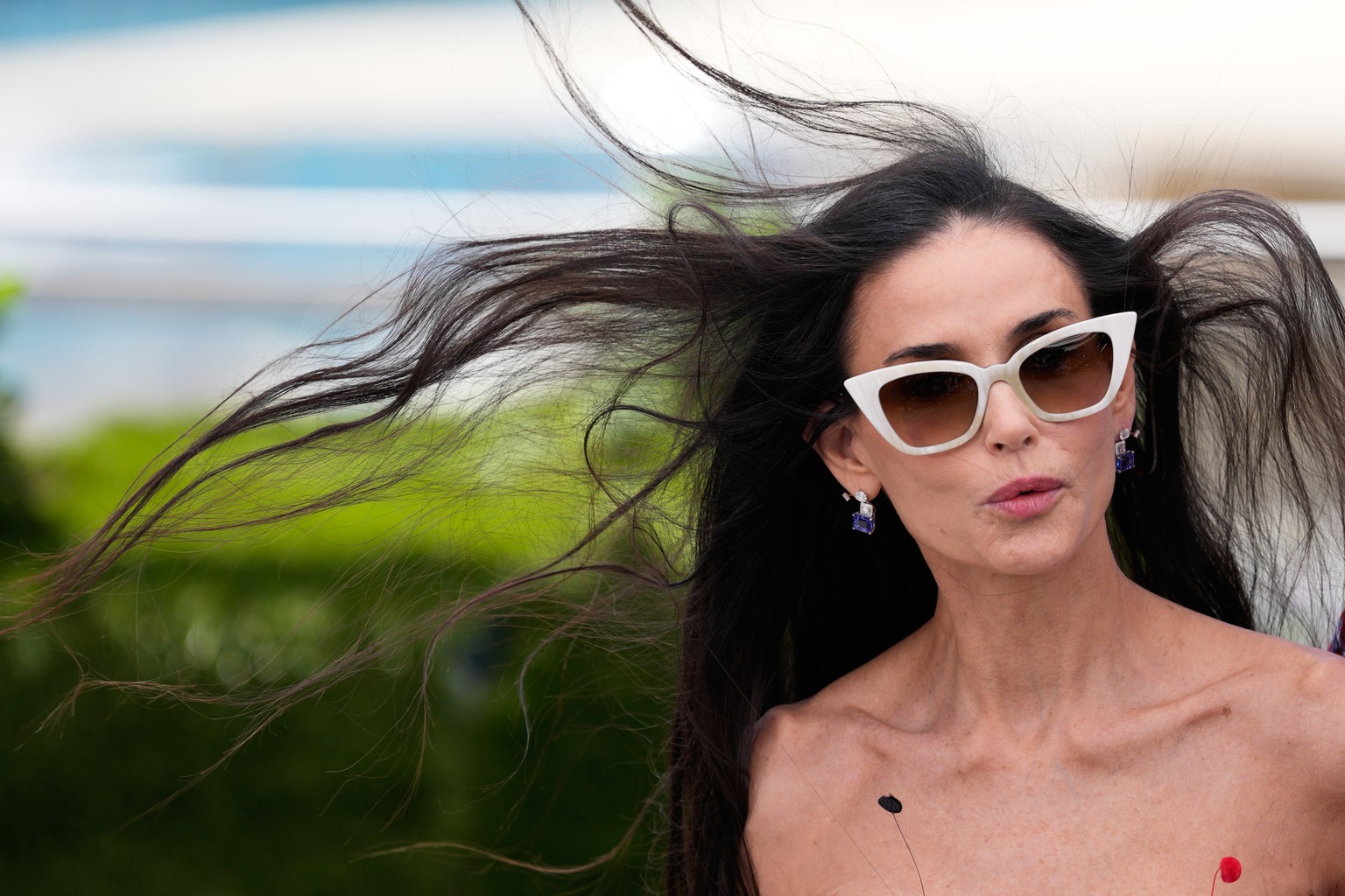 Jury member Demi Moore poses for photographers at the jury photo call at the 79th international film festival, Cannes, southern France, Tuesday, May 12, 2026. (AP Photo/John Locher)
Demi Moore