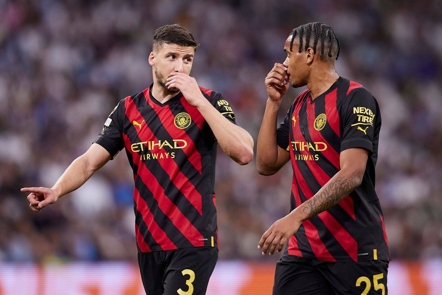 Mandatory credit: Photo by Ruben Albaran/Shutterstock 13905826gv Ruben Dias and Manuel Akanji from Manchester City.  Real Madrid v Manchester City UEFA Champions League Santiag ...