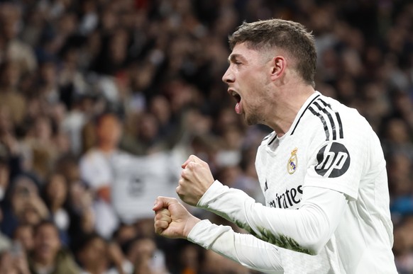 epa12043600 Real Madrid&#039;s Federico Valverde celebrates after scoring against Athletic during their Spanish LaLiga soccer match at Santiago Bernabeu stadium, in Madrid, Spain, 20 April 2025. EPA/C ...