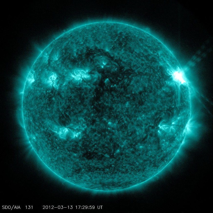 The Sun giving out a large geomagnetic storm on 1:29 pm, EST, 13 March 2012
https://en.wikipedia.org/wiki/Sun#/media/File:Sunspots_and_Solar_Flares.jpg
