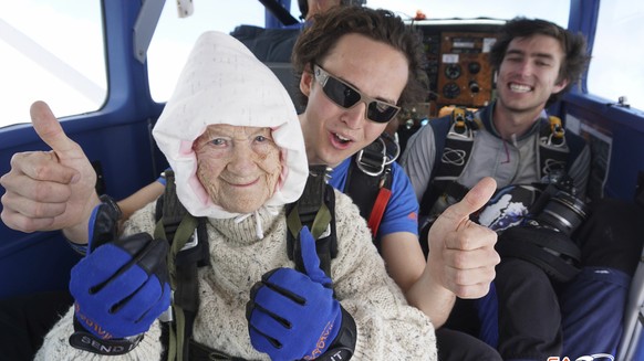 In this Dec. 9, 2018 photo, Irene O’Shea, front, poses before a skydive in Australia. A 102-year-old woman has completed a world record charity skydive in the Australian state of South Australia. Iren ...