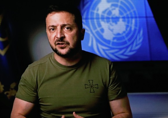 epa10197957 President of Ukraine, Volodymyr Zelenskyy delivers his video address during the 77th General Debate inside the General Assembly Hall at United Nations Headquarters in New York, New York, U ...