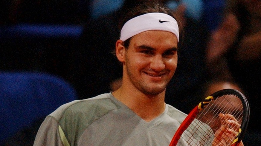 Swiss Roger Federer celebrates after winning the game against Andy Roddick from USA, at the Davidoff Swiss Indoors in Basel, Switzerland, Saturday, October 26, 2002. (KEYSTONE/Dominik Pluess)
