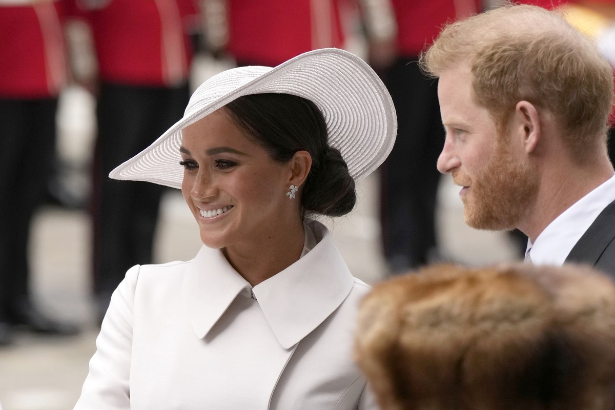Prince Harry and Meghan Markle, Duke and Duchess of Sussex arrive for a service of thanksgiving for the reign of Queen Elizabeth II at St Paul's Cathedral in London, Friday, June 3, 2022 on the s ...