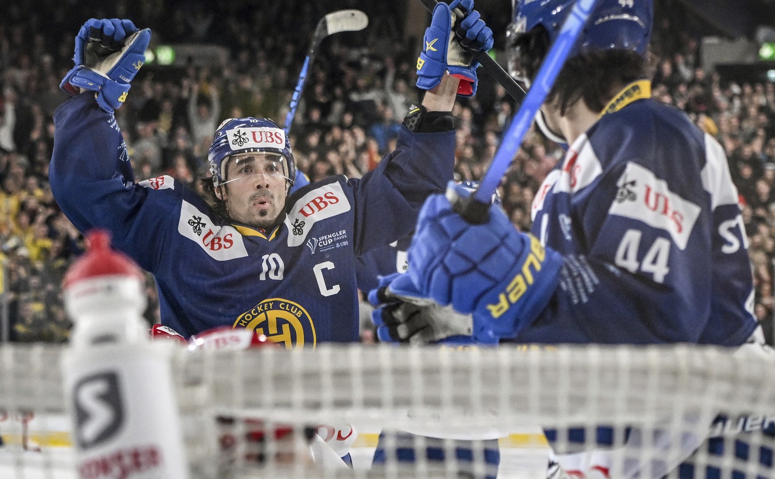 Davos&#039; Andres Ambuhl celebrate after scoring 2-1 during the game between Switzerland&#039;s HC Davos and Finland&#039;s IFK Helsinki, at the 94th Spengler Cup ice hockey tournament in Davos, Swit ...