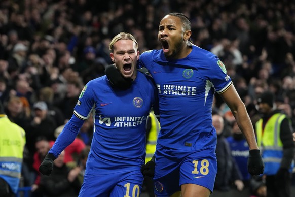 Chelsea&#039;s Mykhailo Mudryk, left, celebrates with teammate Chelsea&#039;s Christopher Nkunku after scoring his sides first goal of the game during the English League Cup quarterfinal soccer match  ...