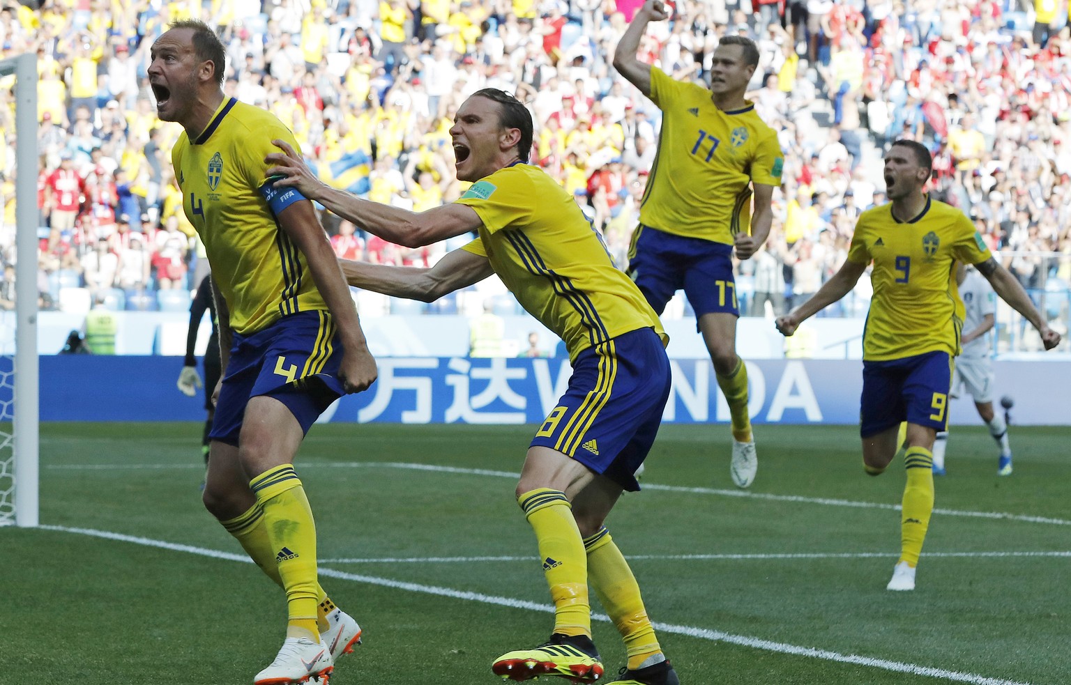 Sweden&#039;s Andreas Granqvist, left, celebrates after scoring the opening goal during the group F match between Sweden and South Korea at the 2018 soccer World Cup in the Nizhny Novgorod stadium in  ...