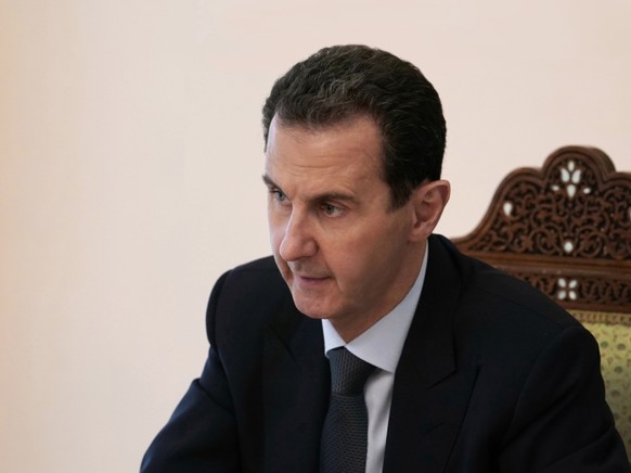 HANDOUT - Baschar al-Assad, Präsident von Syrien, nimmt an einem Treffen der Baath-Partei teil. Foto: -/SANA/dpa - ACHTUNG: Nur zur redaktionellen Verwendung und nur mit vollständiger Nennung des vors ...