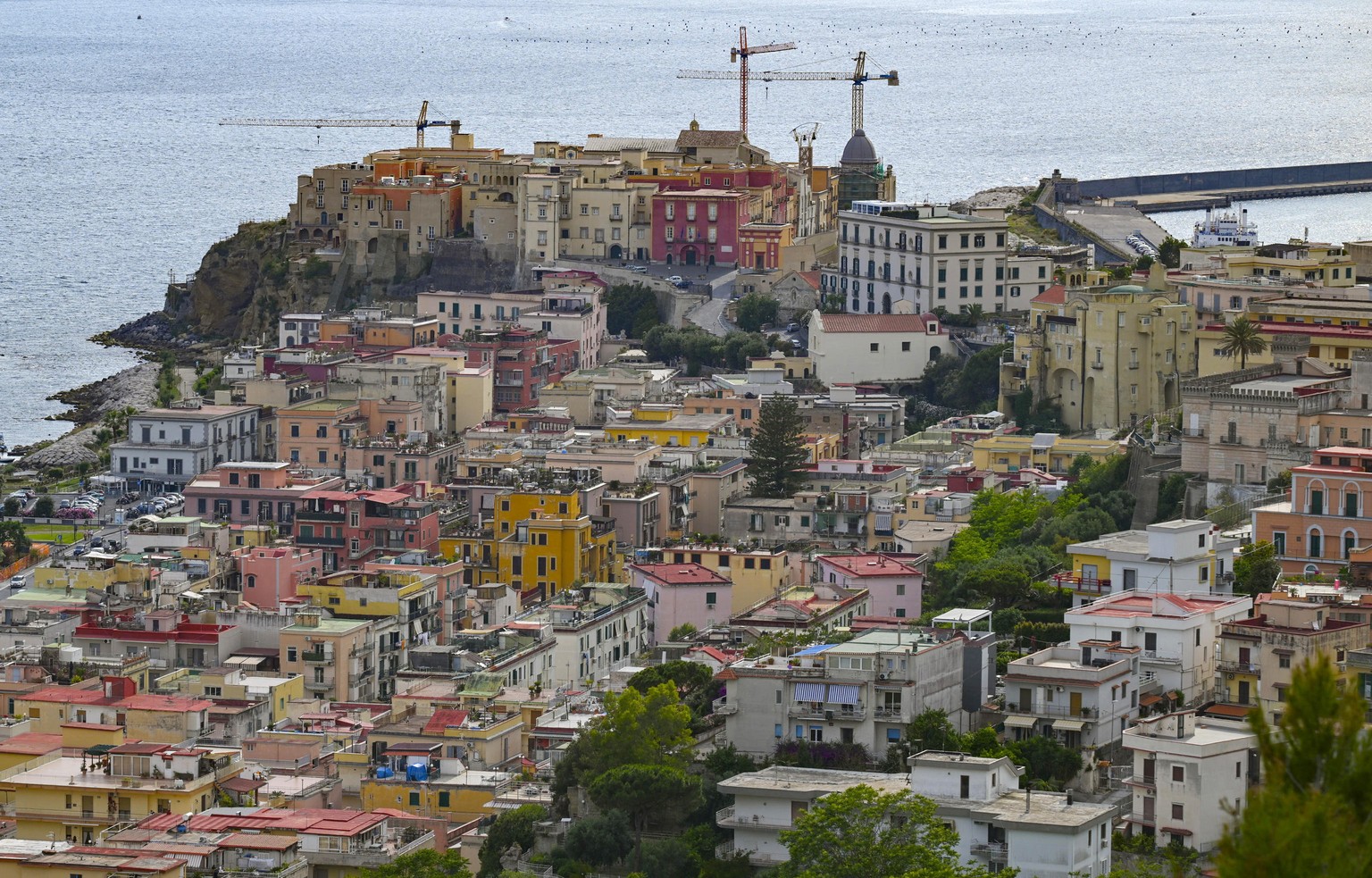 epa11378049 A general view over Pozzuoli, Italy, 29 May 2024. A flurry of quakes, including a 4.4 magnitude one that was the strongest to hit the area in over 40 years, was recorded in the area on lat ...
