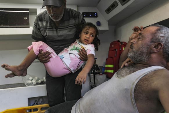 epa13044812 Palestinians transport wounded people to Nasser Hospital in Khan Yunis, southern Gaza Strip, 17 June 2026. At least two Palestinians were killed and several others wounded in an Israeli ai ...