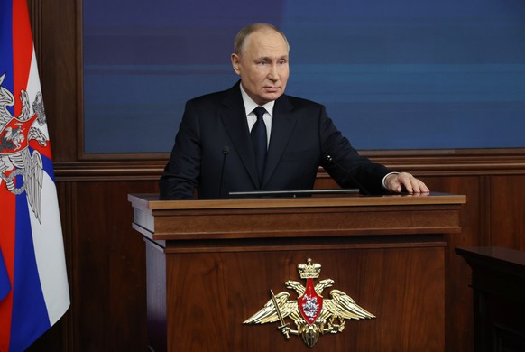 epa11037323 Russian President Vladimir Putin attends an extended meeting of the Russian Ministry of Defense at the Russian National Defense Control Center in Moscow, Russia, December 19, 2023. EPA/MI ...