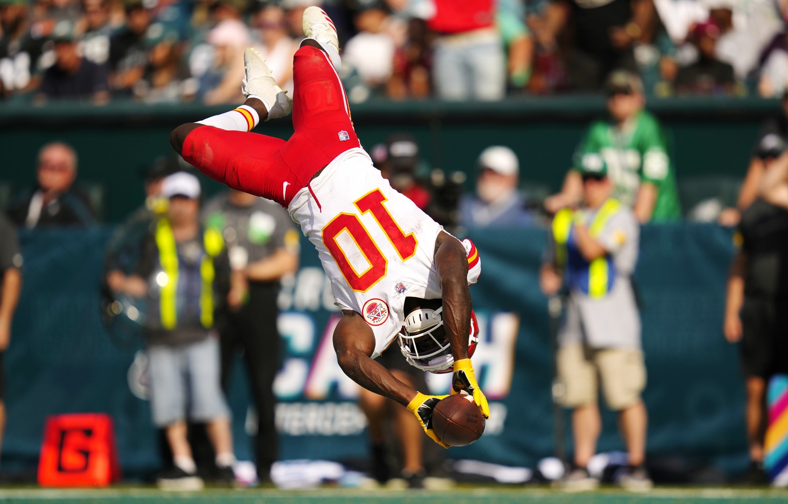 FILE - Kansas City Chiefs wide receiver Tyreek Hill (10) celebrates in the end zone after scoring a touchdown during the second half of an NFL football game against the Philadelphia Eagles on Sunday,  ...