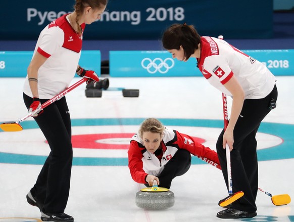 epa06531674 Silvana Tirinzoni, Marlene Albrecht (L) and Esther Neuenschwander (R) of Switzerland during Women&#039;s Curling Round Robin match between South Korea and Switzerland at the Gangneung Curl ...