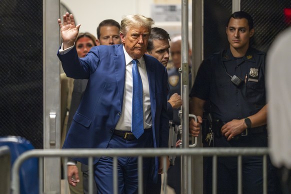 Former President Donald Trump returns from lunch to his trial at the Manhattan Criminal court, Monday, May 20, 2024, in New York. (Steven Hirsch/New York Post via AP, Pool)
Donald Trump