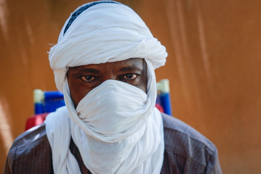 Boubacar Moussa, a former member of the Jama&#039;at Nusrat al-Islam wal-Muslimin group, linked to al-Qaida, poses for a photo in Niamey, Niger, Tuesday, Aug. 1, 2023. The 47-year-old says Niger&#039; ...