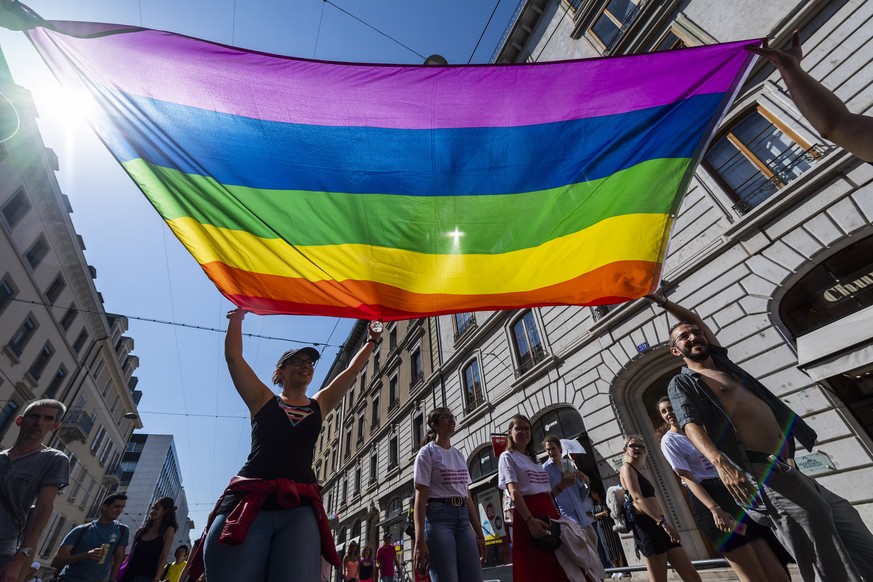 epa07699459 People participate in the Pride March LGBTQ + Pride (Lesbian, Gay, Bi, Trans and more), in Geneva, Switzerland, 06 July 2019. EPA/MARTIAL TREZZINI