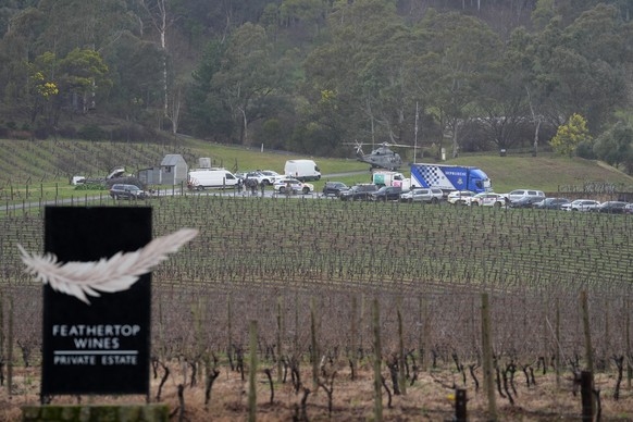 epa12325340 Victorian Police officers prepare at a staging area at Feathertop Winery in Porepunkah in Victoria, Wednesday, August 27, 2025. A significant search is underway for a &quot;heavily armed&q ...