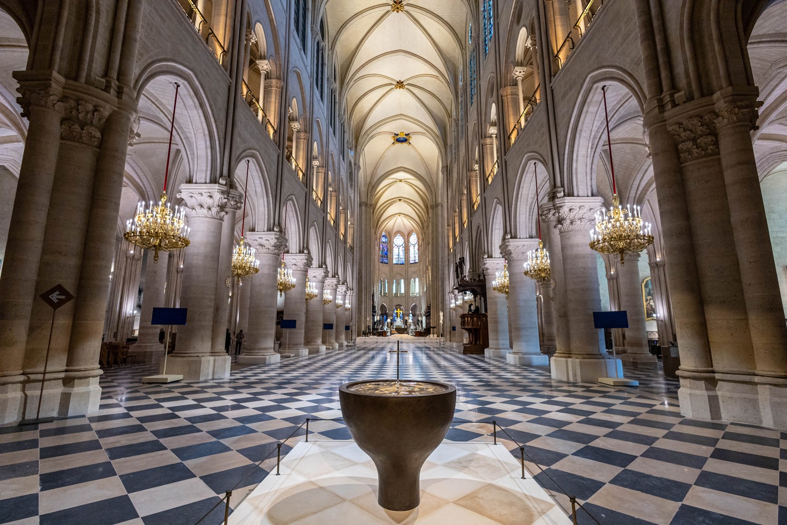 epa11747926 The baptistery designed by French artist and designer Guillaume Bardet of Notre-Dame de Paris cathedral in Paris, France, 29 November 2024. French President Macron is visiting the cathedra ...