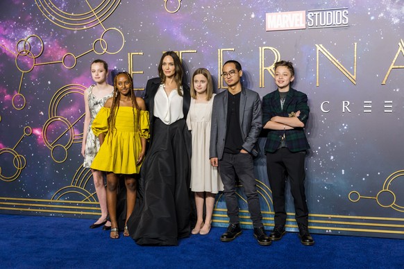 epa09549652 (L-R) Shiloh Jolie-Pitt, Zahara Jolie-Pitt, US actress Angelina Jolie, Vivienne Jolie-Pitt, Maddox Jolie-Pitt and Knox Jolie-Pitt attend the UK premiere of &#039;Eternals&#039; at the BFI  ...