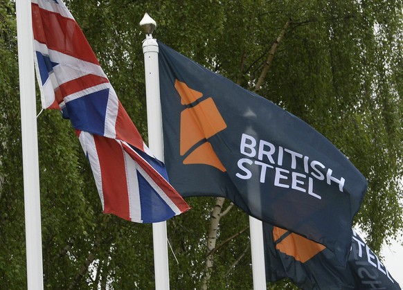FILE - A flag with a British Steel logo at the entrance to the steelworks plant in Scunthorpe, England, June 1, 2016. (Anna Gowthorpe/PA via AP)
Britain Steel