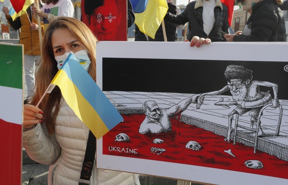 epa10271216 Iranian diaspora members attend a protest against Iranian-made drones supplied to Russia, on Independence Square in Kyiv, Ukraine, 28 October 2022, amid the Russian invasion. Ukrainian Pre ...