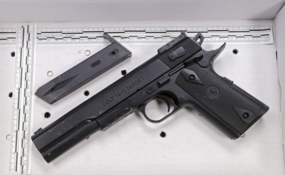 FILE â This Nov. 26, 2014, file photo shows a pellet gun resembling a Colt 1911 pistol that was taken from Tamir Rice after he was fatally shot by a Cleveland police officer, displayed after a news  ...