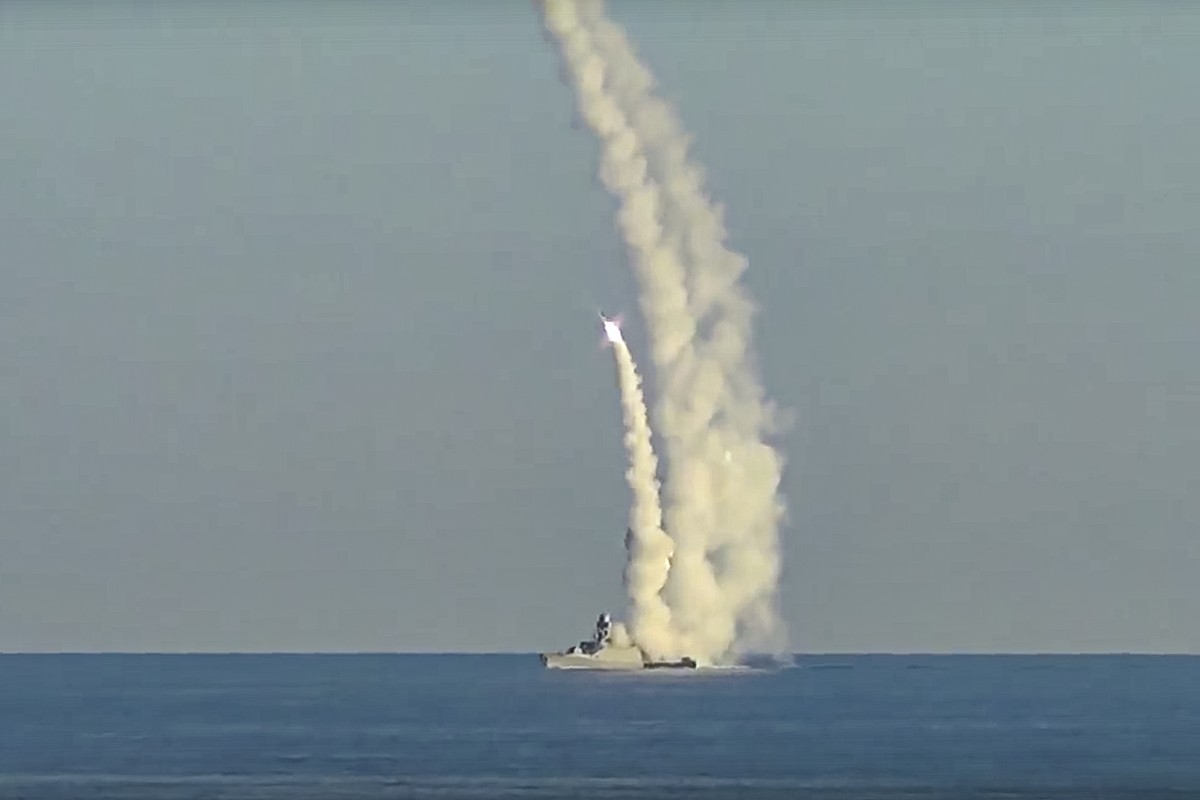 This handout photo taken from video released by Russian Defense Ministry Press Service on Friday, July 15, 2022 shows a long-range Kalibr cruise missiles launched by a Russian military ship from an un ...