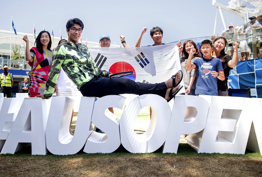 South Korea&#039;s Hyeon Chung poses for a photo with supporters at the Australian Open tennis championships in Melbourne, Australia, Thursday, Jan. 25, 2018. Chung will play Switzerland&#039;s Roger  ...