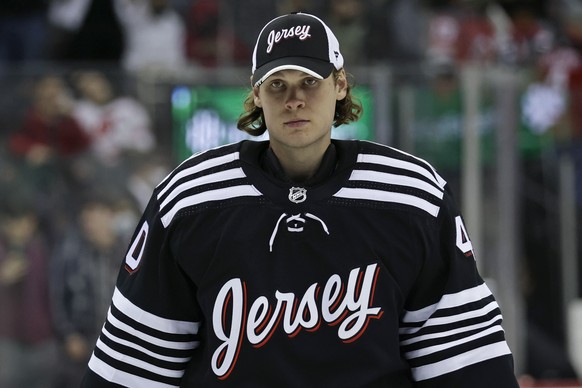 New Jersey Devils goaltender Akira Schmid skates off the ice after losing to the Dallas Stars in an NHL hockey game Tuesday, Jan. 25, 2022, in Newark, N.J. The Stars won 5-1. (AP Photo/Adam Hunger)
Ak ...