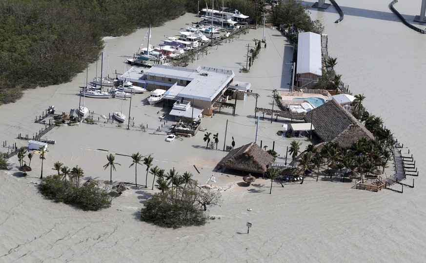 Floodwaters surround Gilbert&#039;s Resort in the aftermath of Hurricane Irma, Monday, Sept. 11, 2017, in Key Largo, Fla. (AP Photo/Wilfredo Lee)