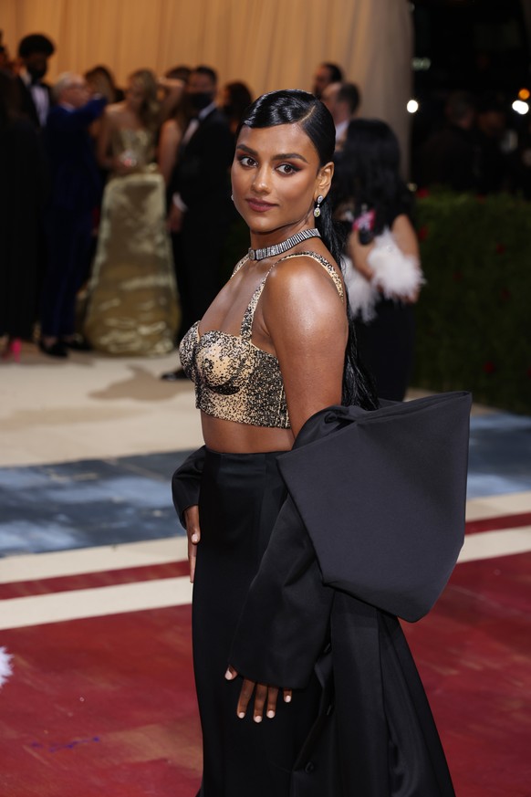 epa09923943 Simone Ashley on the red carpet for the 2022 Met Gala, the annual benefit for the Metropolitan Museum of Art's Costume Institute, in New York, New York, USA, 02 May 2022. The event co ...
