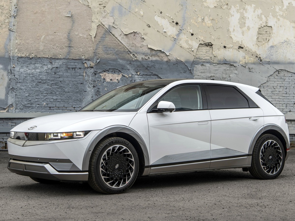 This photo provided by Hyundai shows the 2022 Ioniq 5. The Ioniq 5 stands out with its retro-themed styling and impressive performance and comfort. (Courtesy of Hyundai Motor America via AP)