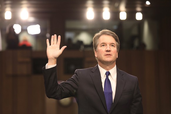 epa06997409 Circuit judge Brett Kavanaugh is sworn in during his Senate confirmation hearing to be an Associate Justice of the Supreme Court of the United States in the Hart Senate Office Building in  ...