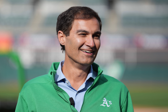 MLB, Baseball Herren, USA Minnesota Twins at Oakland Athletics, May 16, 2022; Oakland, California, USA; Oakland Athletics president Dave Kaval talks on the field before the game against the Minnesota  ...