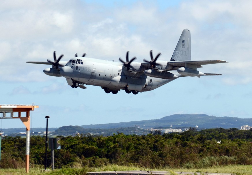 epa07211418 A United States Marine Corps Lockheed Martin KC-130 transport aircraft lands at US Marine Corps Air Station Iwakuni in Iwakuni, Yamaguchi prefecture, western Japan, 15 July 2014 (issued 06 ...