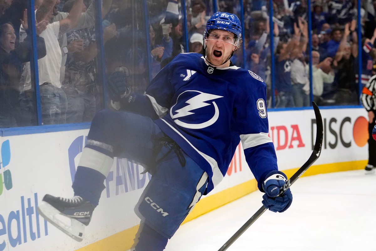 Tampa Bay Lightning defenseman J.J. Moser (90) celebrates after scoring the game-winning goal against the Montréal Canadiens during overtime in Game 2 of an NHL hockey Stanley Cup first-round playoff  ...