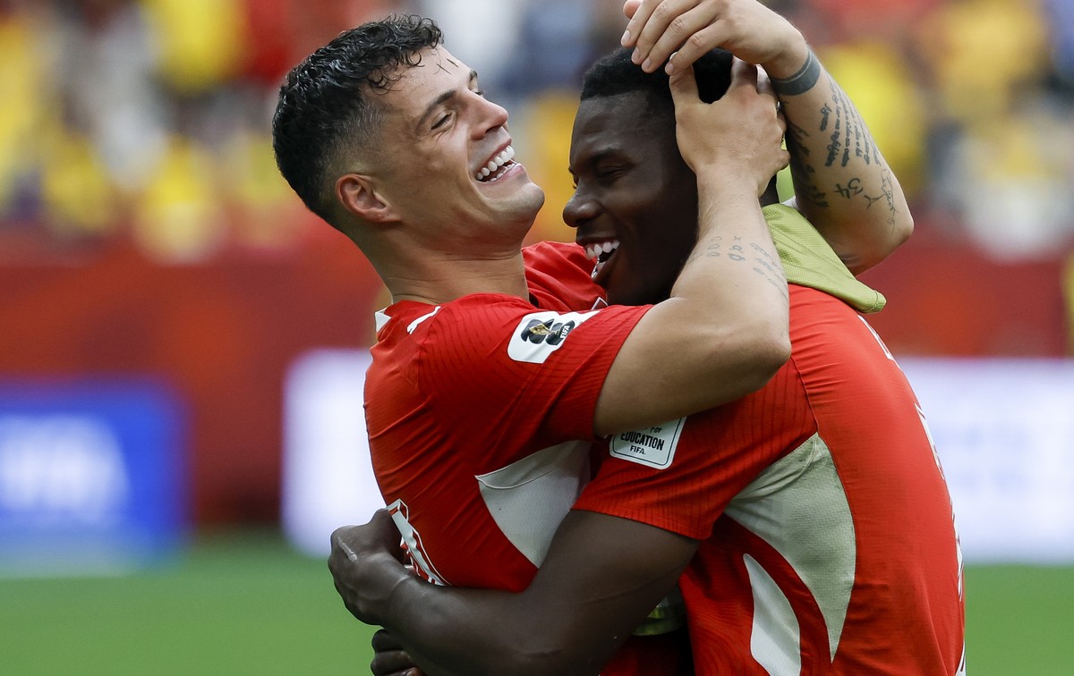 epa13096807 Switzerland's Granit Xhaka (L) and Breel Embolo celebrate winning the FIFA World Cup 2026 Round of 16 match Switzerland against Colombia, in Vancouver, Canada, 07 July 2026. EPA/PETER ...