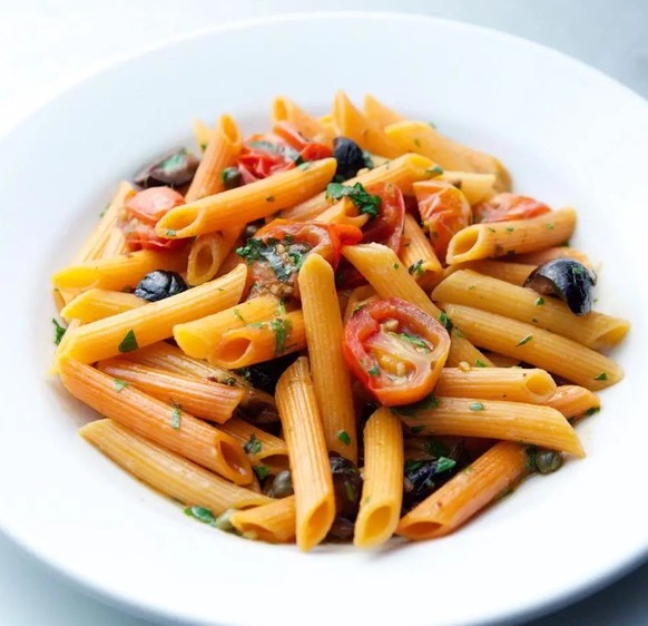 Penna alla Tallulah – basically a lighter version of puttanesca with cherry tomatoes instead of pelati. 
https://food.fnr.sndimg.com/content/dam/images/food/fullset/2015/10/27/0/WO0706_Red-Pepper-Penn ...
