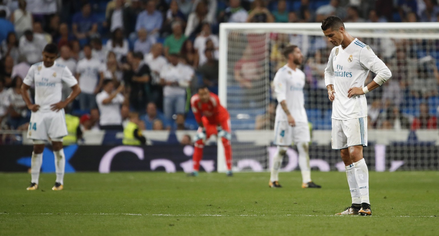 epa06216760 Real Madrid&#039;s forward Cristiano Ronaldo (R) reacts after Real Betis scoring the goal during their Spanish Liga Primera Division soccer match played at the Santiago Bernabeu stadium in ...