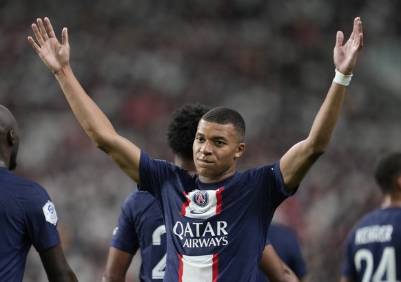 epa10087708 Paris Saint-German F.C. Kylian Mbappe celebrates after scoring a goal during a friendly match against J1 league club Urawa Reds at Saitama Stadium, north of Tokyo, Japan, 23 July 2022. EPA ...