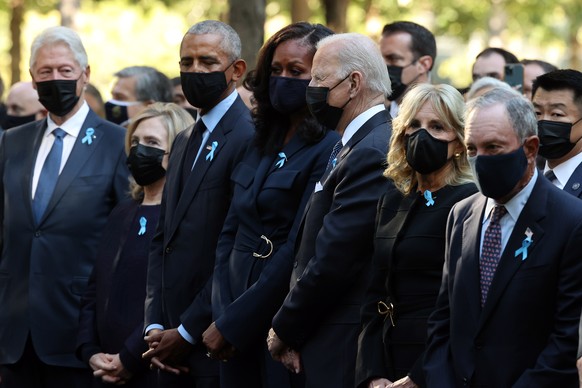 epa09461107 (L-R) Former President Bill Clinton, former First Lady Hillary Clinton, former President Barack Obama, former First Lady Michelle Obama, President Joe Biden, First Lady Jill Biden and form ...