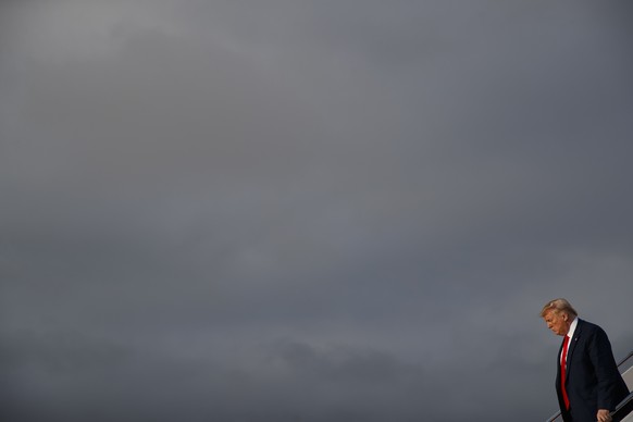 President Donald Trump arrives at Andrews Air Force Base after attending an event on Medicare in Florida, Thursday, Oct. 3, 2019, in Andrews Air Force Base, Md. (AP Photo/Evan Vucci)
Donald Trump