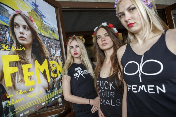 epa06907746 (FILE) - Three activists of the feminist Ukrainian protest group Femen (L-R) Alexandra &#039;Sasha&#039; Shevchenko, Oxana Shachko and Yana Zhdanova pose for the photographer before the sc ...