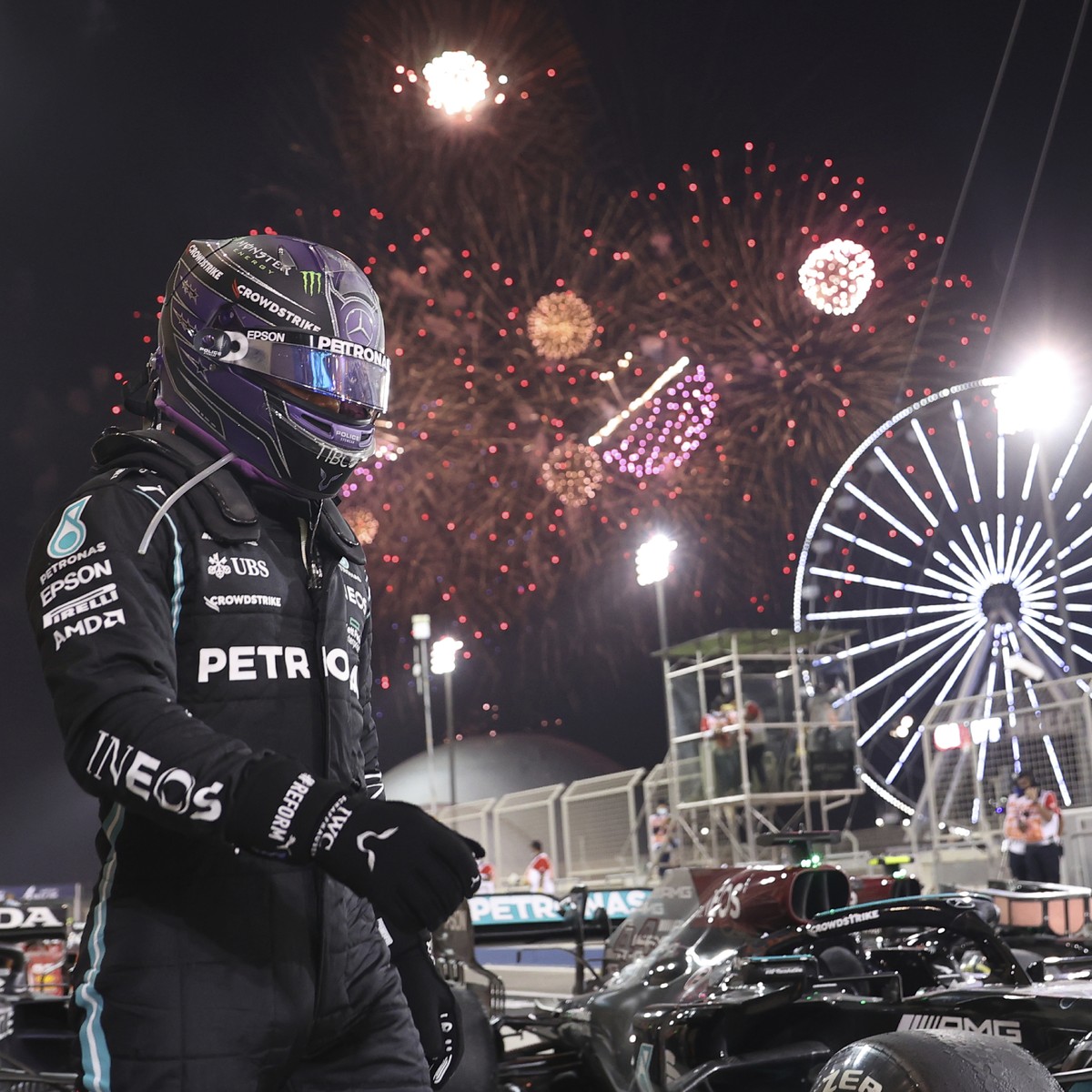 Mercedes driver Lewis Hamilton of Britain celebrates winning the Bahrain Formula One Grand Prix at the Bahrain International Circuit in Sakhir, Bahrain, Sunday, March 28, 2021. (Lars Baron, Pool via A ...