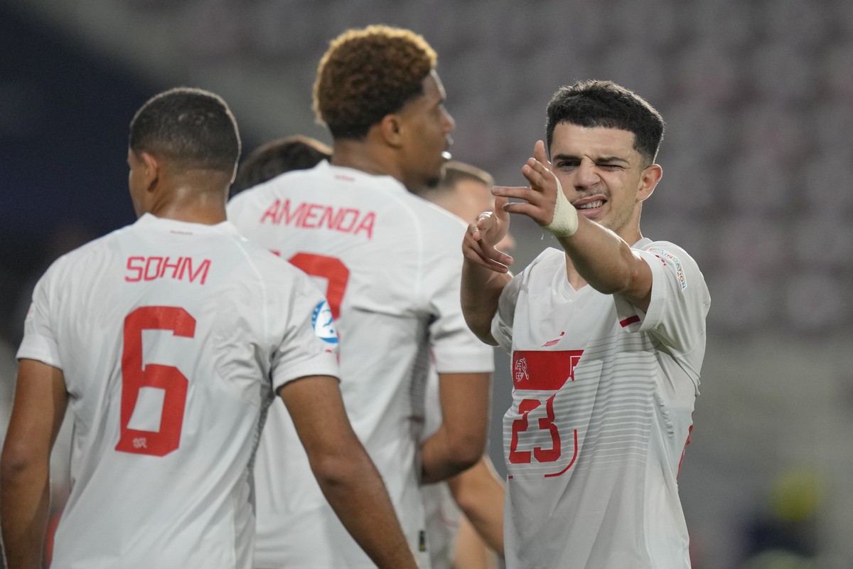 Switzerland's Zeki Amdouni celebrates after scoring his side's first goal during the Euro 2023 U21 Championship quarterfinal soccer match between Spain and Switzerland at the Giulesti stadiu ...