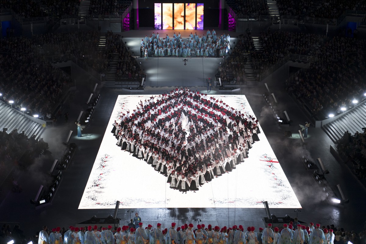 Extras are pictured in the arena of the "Fete des Vignerons" (winegrowers' festival in French), with a capacity of 20'000 spectators and hosting a giant central LED floor of approx ...