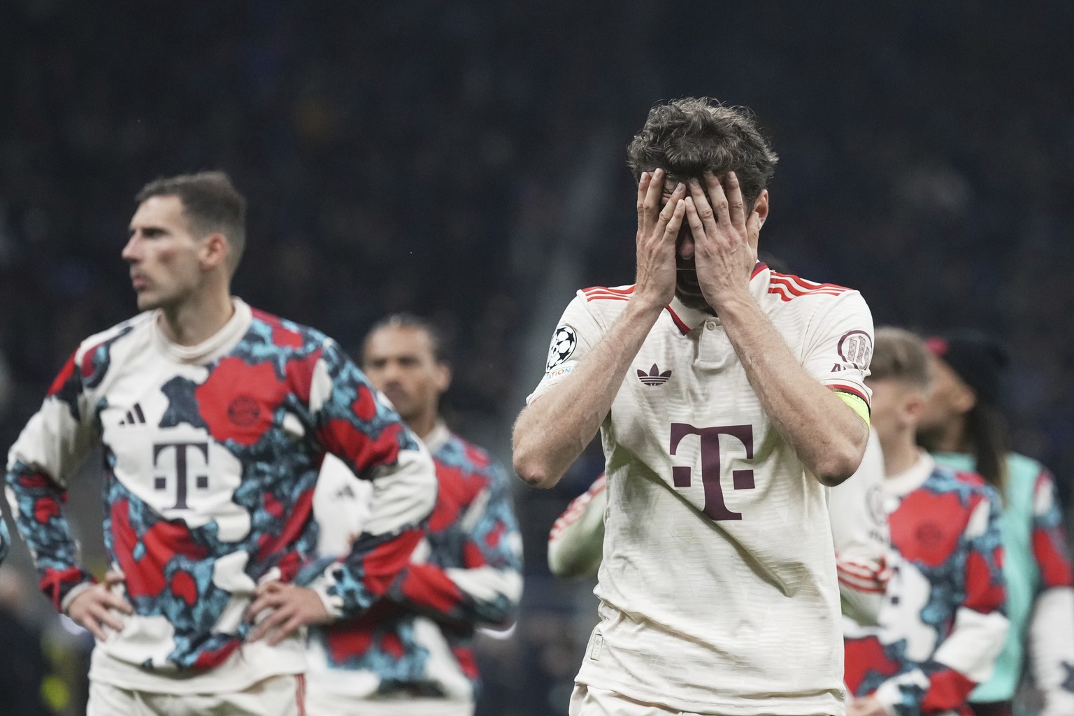 Bayern's Thomas Mueller reacts at the end of the Champions League quarterfinal second leg soccer match between Inter Milan and Bayern Munich at the San Siro stadium in Milan, Italy, Wednesday, Ap ...