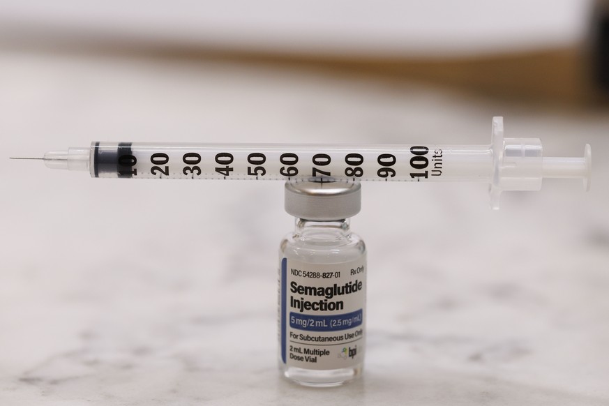 epa11924695 A vial of semaglutide and an injection needle on a counter in Woburn, Massachusetts, USA, 25 February 2025. Drug compounders have sued the US Food and Drug Administration following the dec ...